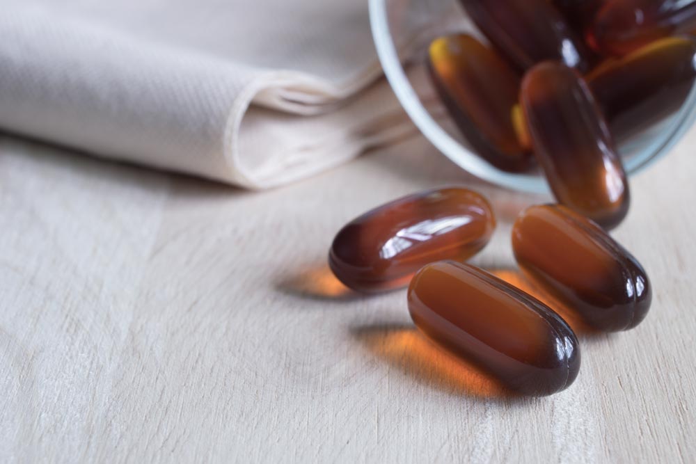 brown capsules with cbd oil